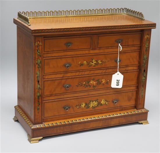 A painted miniature satinwood Wellington chest length 43cm